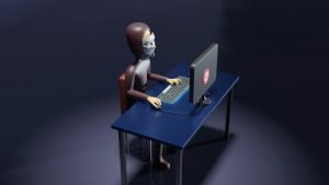 Stylized illustration of a masked figure at a computer, representing digital security threats