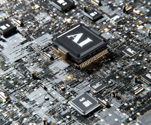 Close-up of a computer chip labeled AI mounted on a densely packed circuit board